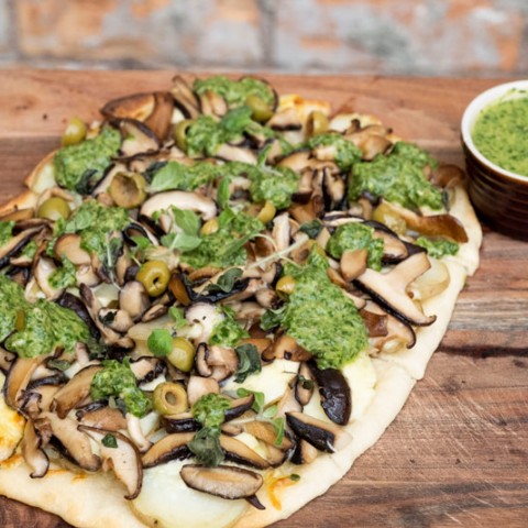 Shiitake, green olive & potato Pizza with rocket salsa verde